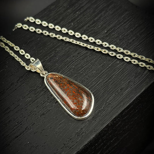Red Dinobone Pendant